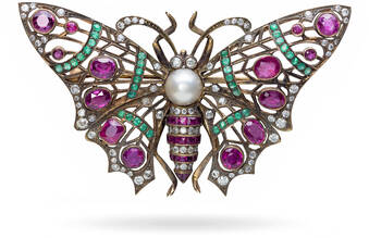 Schmetterling mit Rubinen - Gemtrade AG
